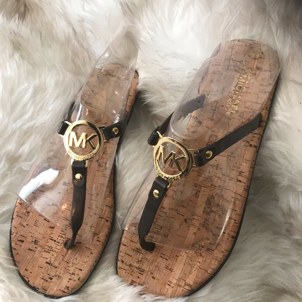 Michael Kor Charm jelly Sandals with cork lining.